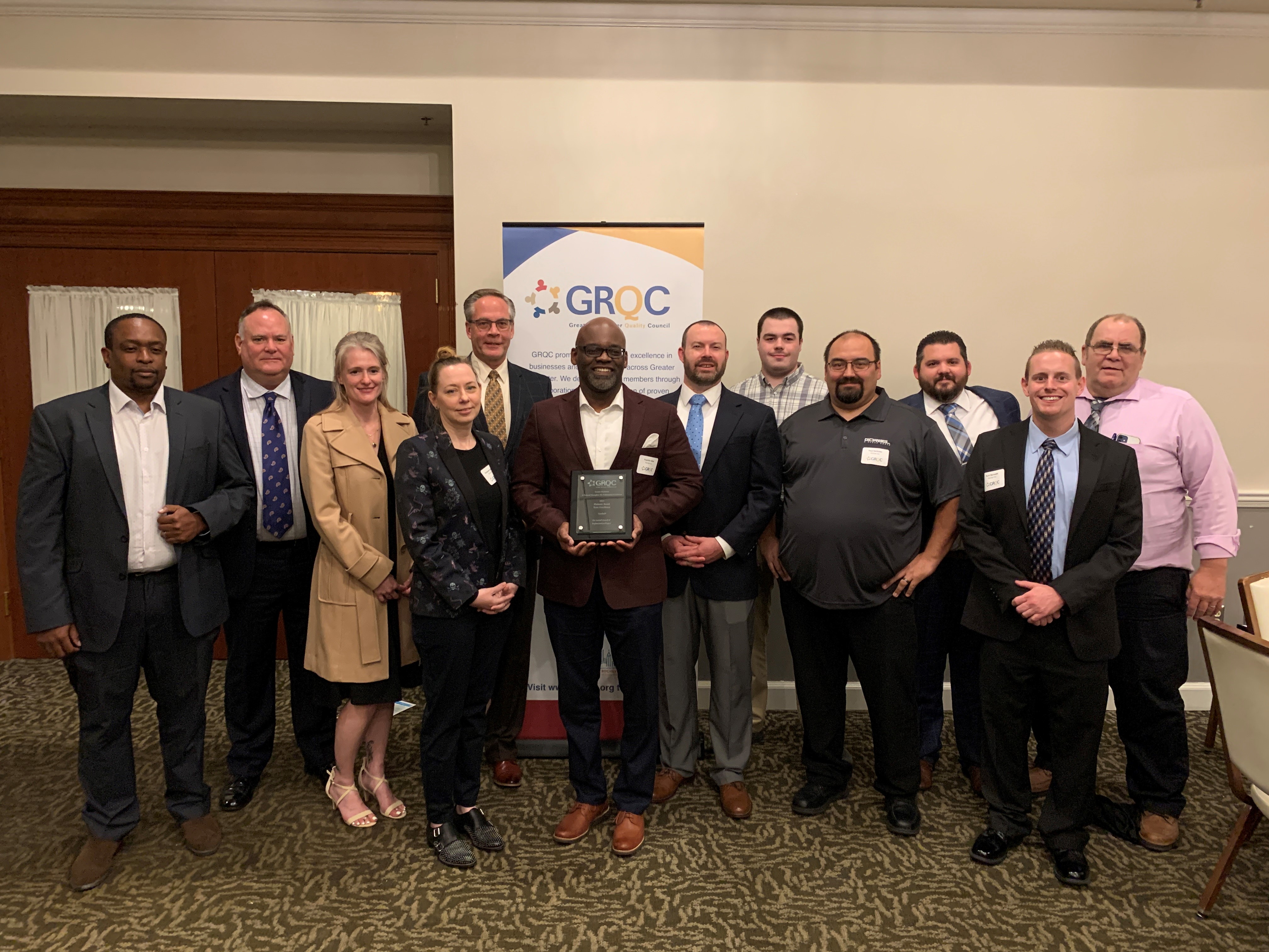 Team Gorbel® Poses with Award